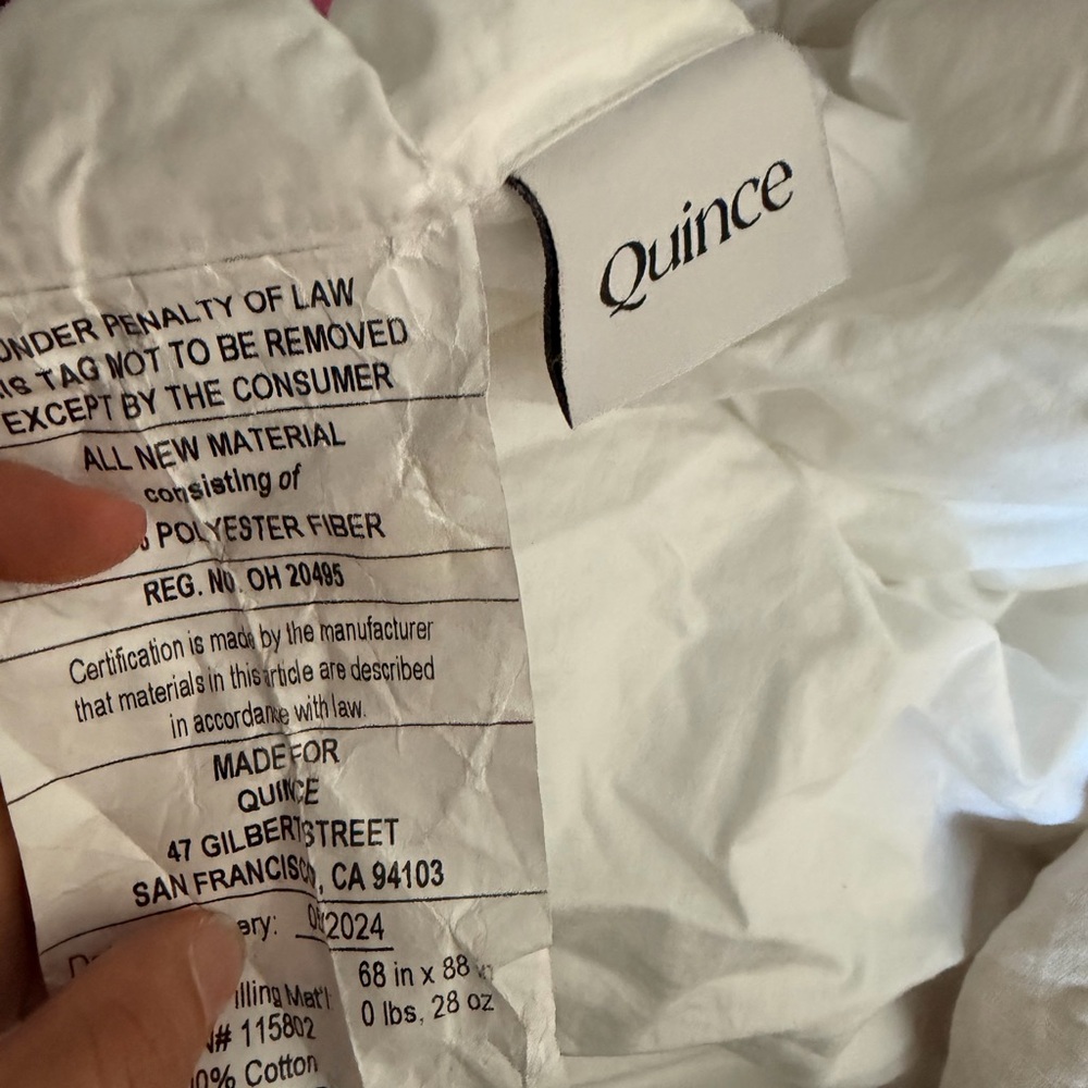 Quince Soft White Polyester Bedding and a cover